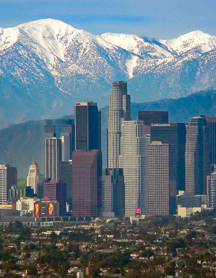 L.A. skyline against snowy San Gabriel Mountains